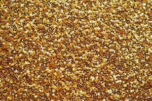 Abstract gold glitter sparkle background photo