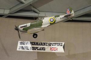 Batu, East Java, Indonesia - August  10, 2022, Supermarine Spitfire, Model Airplane 1938, Antique white green airplane in Angkut museum photo