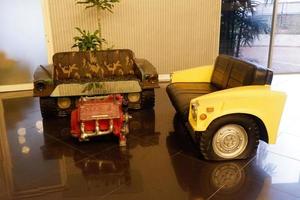 Batu, East Java, Indonesia - August  10, 2022, Two seats uniq model like a car Antique in Angkut museum photo