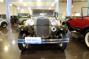 Batu, East Java, Indonesia - August  10, 2022, Ford Model A , Thn 1994 -3300 cc, Antique black car  in Angkut museum photo