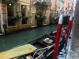 Venice, Italy, 2019. View of the canal and the boat. photo