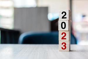 block 2023 text on table. Resolution, strategy, plan, goal, motivation, reboot, business and New Year holiday concepts photo