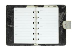 old notebook open isolated on white background with clipping path photo