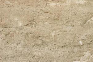 Grunge concrete cement wall with crack in industrial building, design and texture background photo