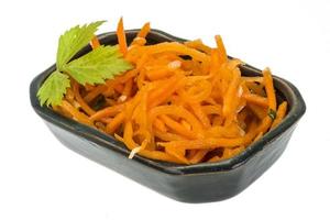 Korean carrot in a bowl on white background photo