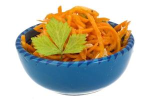 Korean carrot in a bowl on white background photo