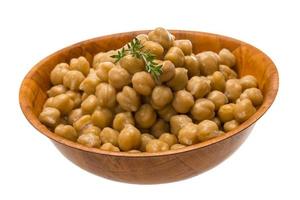 Chickpea in a bowl on white background photo