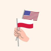 Cartoon Hand Holding United States And Polish Flags. US Poland Relationships. Concept of Diplomacy, Politics And Democratic Negotiations. Flat Design Isolated Vector