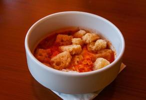 Tomato soup in the bowl photo