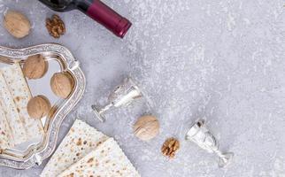 festive background of the Jewish Passover with traditional treats. top view. a copy of the space. gray concrete background. photo