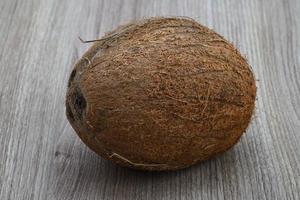 Coconut on wood photo