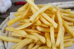 French fries on wood photo