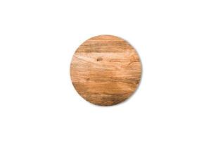 Empty round wooden cutting board isolated on white background with clipping path for work or design photo