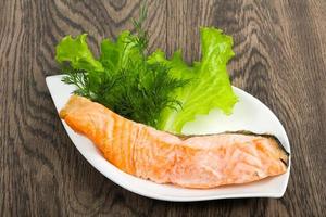 Steamed salmon dish view photo