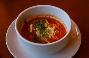 Tomato soup dish view photo