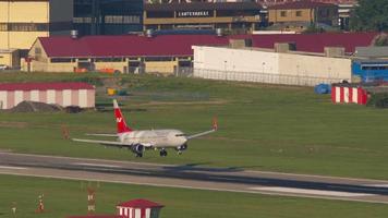 SOCHI, RUSSIA JULY 29, 2022 - Boeing 737 of Nordwind landing and braking at Sochi airport. Tourism and travel concept video