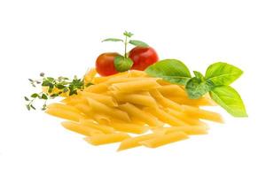 Raw macaroni on white background photo