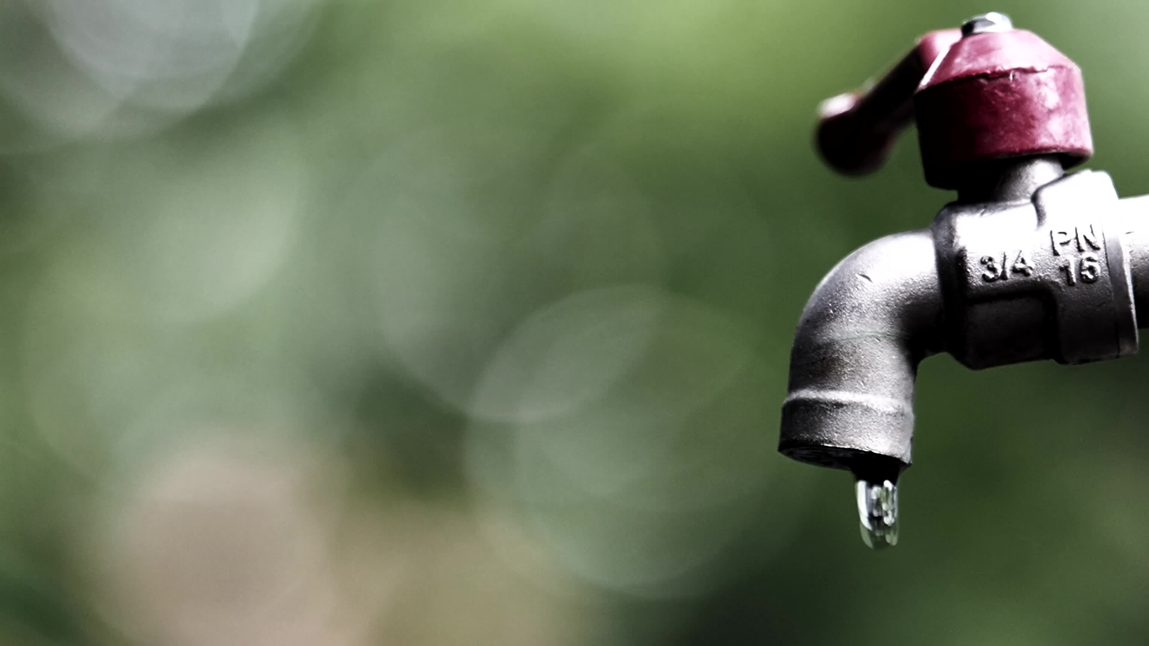 The concept of water crisis and despair from lack of clean water caused by drought. The faucet