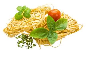 Egg noodle on white background photo