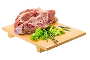 Raw lamb on white photo