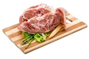 Raw lamb on white photo