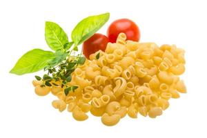 Raw macaroni on white photo