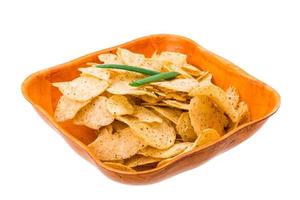 Potato chips on white photo
