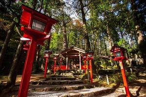 Kurama, Kyoto Prefecture, Kansai, Japan - November 21, 2019 - Tourists visit to Kibune Shrine Yuinoyashiro on mount Kurama photo