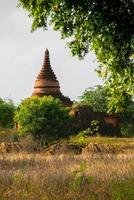 Ancient pagodas in old Bagan, an ancient city located in the Mandalay Region of Myanmar photo