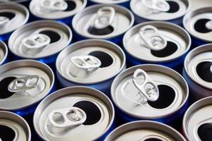 Empty aluminium drink cans recycling background concept photo