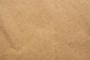 Old brown eco recycled kraft paper texture cardboard background photo