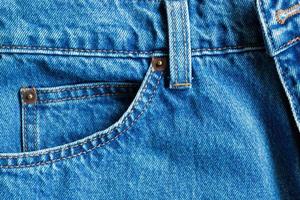 blue denim jeans bolsillo textura fondo primer plano foto
