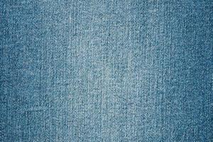 Denim blue jeans texture close up background top view photo