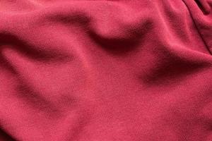 Red clothing fabric texture pattern background photo