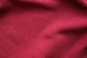 Red clothing fabric texture pattern background photo