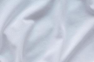 White sports clothing fabric football shirt jersey texture background photo
