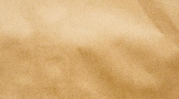 Brown paper eco recycled kraft sheet texture cardboard background photo
