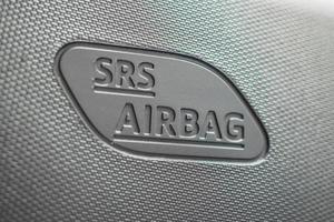 Safety side curtain airbag sign in new modern car photo