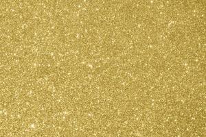 Abstract gold glitter sparkle background photo