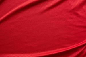 sports clothing fabric football jersey texture top view red color photo