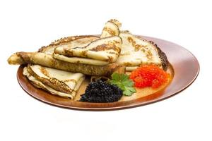 Russian pancakes on white photo