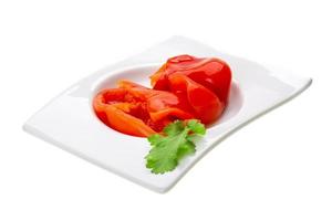 Marinated pepper on white photo