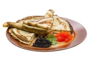 Russian pancakes on white photo