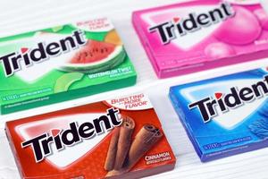 KHARKIV, UKRAINE - MARCH 15, 2021 Packs of Trident gums. Trident was introduced in 1964 as one of the first patented sugarless gums photo