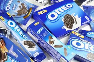 KHARKIV, UKRAINE - FEBRUARY 14, 2021 Oreo original and thins crispy cookies packs. The brand Oreo is owned by company Mondelez international photo