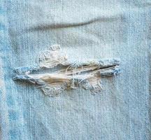 denim blue jeans rasgado moda diseño textura cerrar fondo vista superior foto
