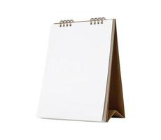 White blank paper desk calendar mockup isolated on white background photo