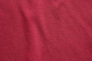 Red clothing fabric texture pattern background photo