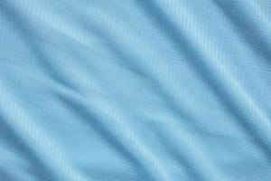 Blue football jersey clothing fabric texture sports wear background photo