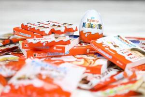 KHARKIV, UKRAINE - FEBRUARY 14, 2021 Kinder Chocolate various production. Kinder is a confectionery product brand line of multinational confectionery Ferrero. photo